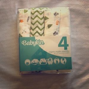 Four organic muslin newborn/infant swaddles